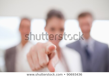 Stockfoto: Personnel Department Team Pointing At Their New Employee