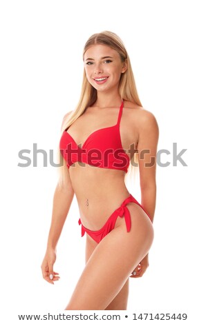 [[stock_photo]]: Beautiful Woman In Bikini Isolated On Red Background