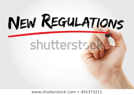 [[stock_photo]]: Blackboard With The Text New Regulation