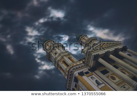 [[stock_photo]]: Holy Cross Glowing Bright Moon On A Dark Sky The Dark Clouds