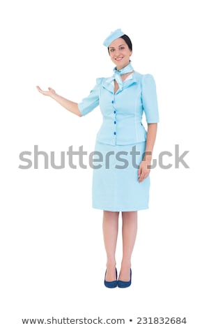 Stok fotoğraf: Pretty Air Hostess Presenting With Hand