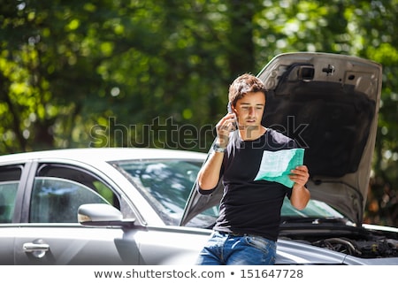 Stock fotó: Handsome Young Man With His Car Broken Down By The Roadside