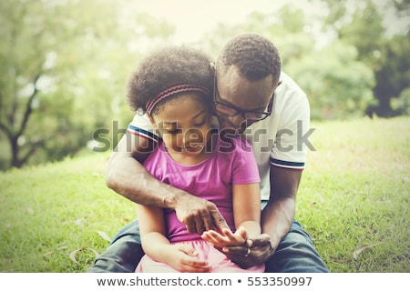 Сток-фото: Portrait Of Joyful African American Man Smiling And Holding Smar