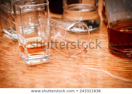 Stockfoto: Drivers With A Bottle Alcohol