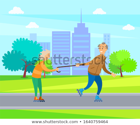 Foto stock: Old People Having Fun In Park Man And Woman Rolling