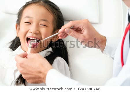 Stock photo: Little Girl Patient Dental Exam