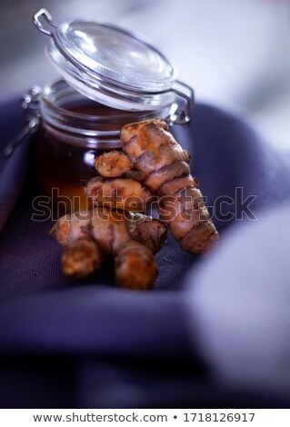 Stock fotó: Close Up Of A Cinnamon Stick Against A Black Background