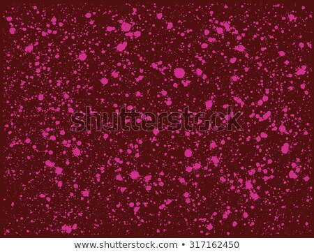 Foto d'archivio: Graffiti Paint Splatter Pattern In Pink Over Deep Red