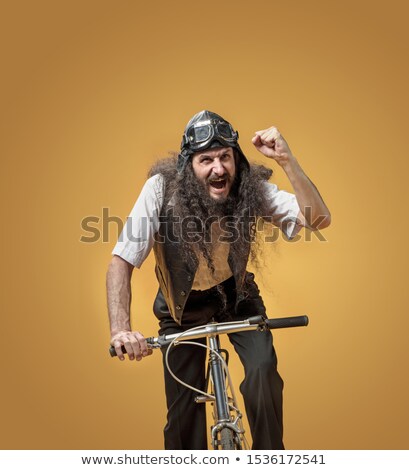 Foto stock: Portrait Of A Funny Yelling Cyclist