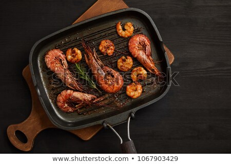 Foto stock: Cooked Shrimp On Top Of Wooden Cutting Board