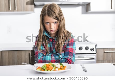 ストックフォト: Boring Expression With Fresh Colorful Vegetables Child