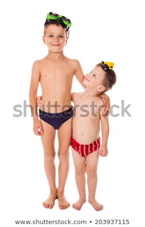 Stockfoto: Two Boys Dive In Swimming Goggles In The Sea