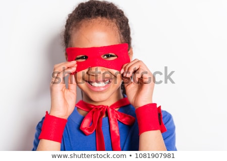 Stock photo: Portrait Of Girl In Superhero Costume Against Grey Background