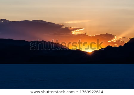 [[stock_photo]]: Sunset Behind Mountains