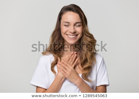 ストックフォト: Female Hand Holding Heart Model In Front Of Chest