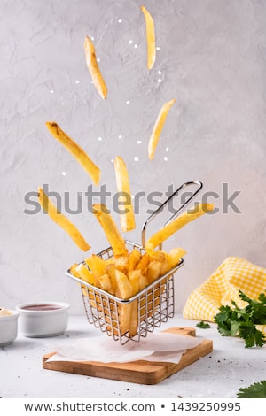 Stock fotó: Crispy Potato Chips In Copper Basket