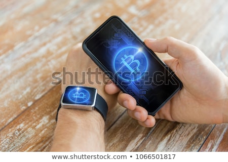 Сток-фото: Close Up Of Bitcoin On Smartphone And Smart Watch