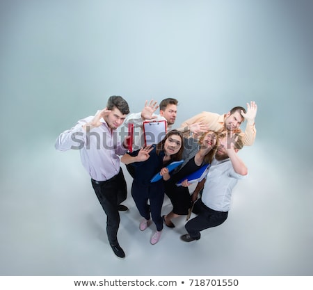 Stok fotoğraf: Small Businessman Kicked By Big Shoe