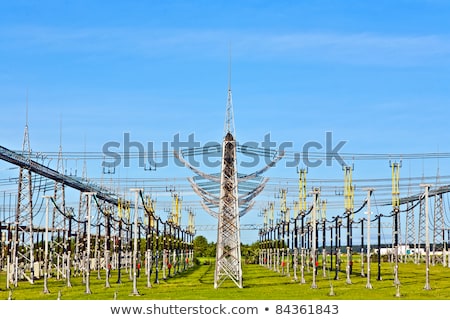 Foto stock: Electrical Power Plant In Beautiful Colorful Meadow