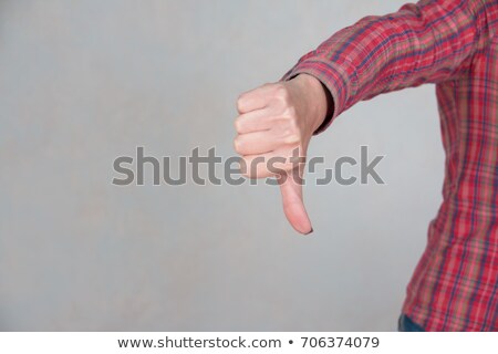 Stock photo: Woman With Thump Down