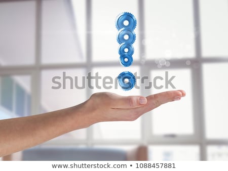 Stock photo: Hand Holding Exclamation Mark Made Of Cogs