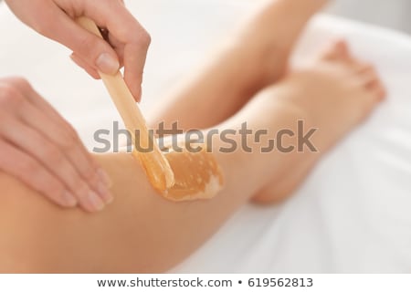 Stock fotó: Beautician Waxing Womans Leg