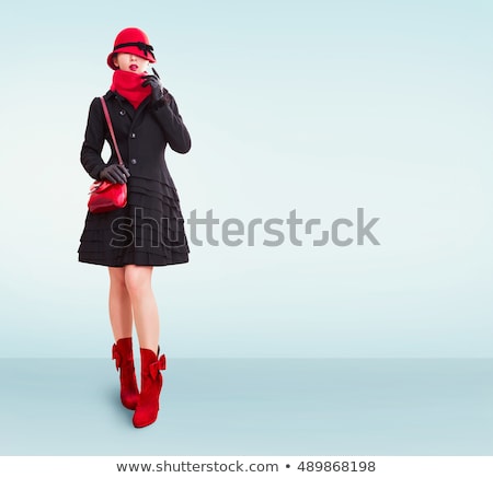 Stock fotó: Cute Girl Wearing A Coat And Black Leggings Isolated