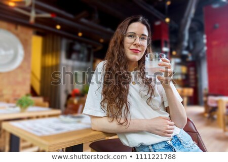 Cute Woman Waiting In The Restaurant Stockfoto © 2Design