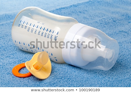 Foto stock: Baby Bottle Pacifier And Towels