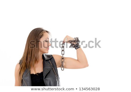 Foto stock: Young Gang Girl Showing Her Biceps In Studio