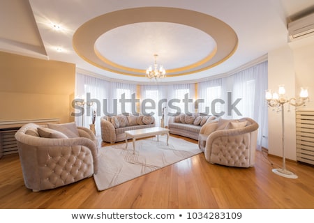 Stockfoto: Orange Room With Ceiling Lamps