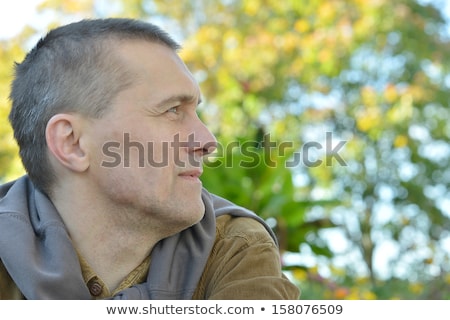 Foto stock: Pensive Man In The Garden