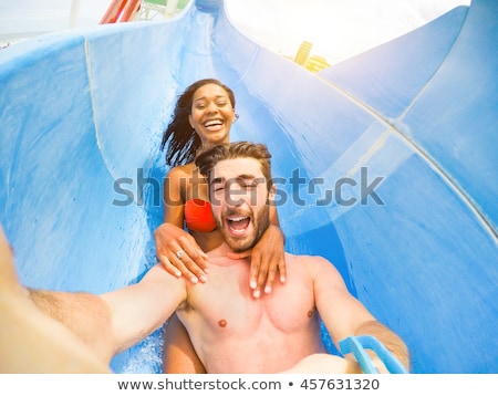 Stock fotó: Boy Is Having Fun In The Water Park