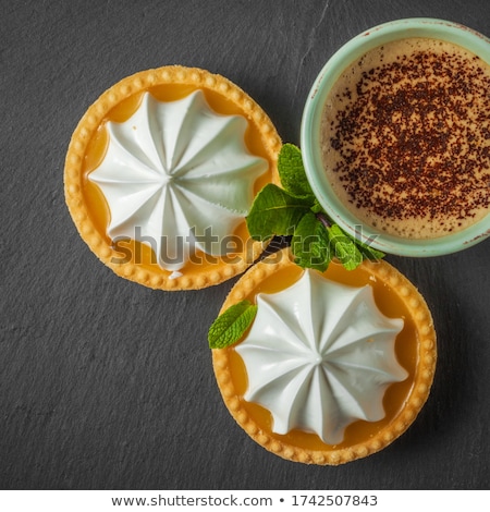 [[stock_photo]]: Cappuccino With Lemon And Dark Chocolate Tarts