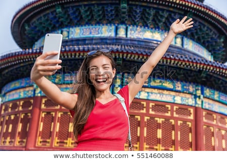 Stok fotoğraf: Asian Tourist Woman Taking Selfie Photo With Phone In Beijing China Asia Travel Famous Destination