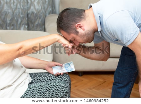 Zdjęcia stock: Young Man Kissing A Beautiful Woman