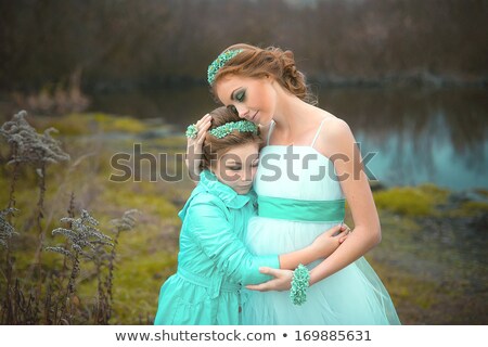 [[stock_photo]]: Portrait Of Bride With Bridesmaid In Marquee At Reception