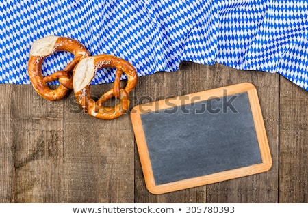 ストックフォト: Blackboard With A Bavarian Diamond Pattern And Pretzels