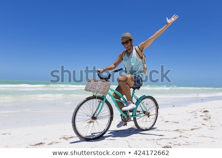 Сток-фото: People Using Cycle On The Beach