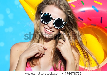 Stock photo: Close Up Portrait Of A Pretty Girl With Air Mattress