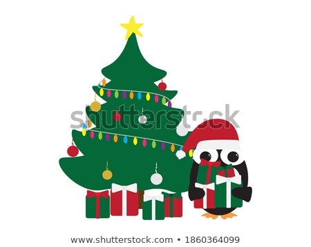 Stock photo: Penguin In Santa Hat Near Decorated Christmas Tree