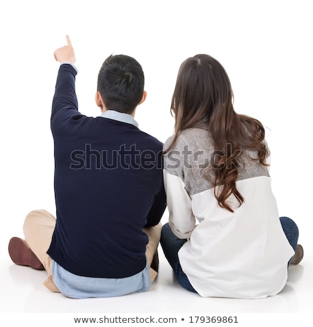 Stok fotoğraf: Two Persons Sitting Back To Back