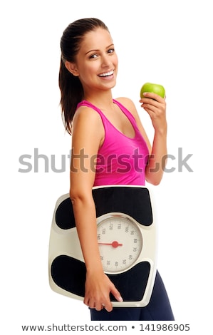 Stock fotó: Happy Young Woman Holding Weighing Scale And Apple