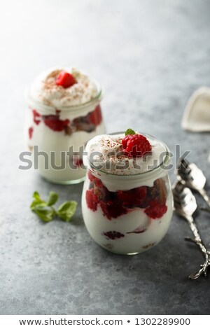 Stockfoto: Delicious Custard With Raspberries And Spoon