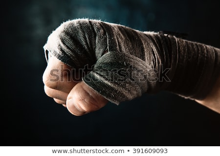 [[stock_photo]]: Close Up Hand Of Muscular Man With Bandage