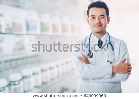 Foto stock: Young Confident Surgeon With Arms Crossed