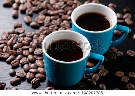 Foto stock: Turquoise Cup Of Coffee With Saucer Close Up