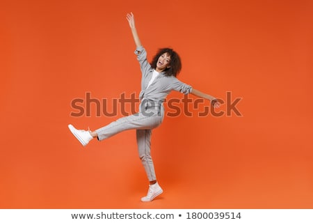 Stok fotoğraf: Full Length Portrait Of A Cheerful Afro American Woman