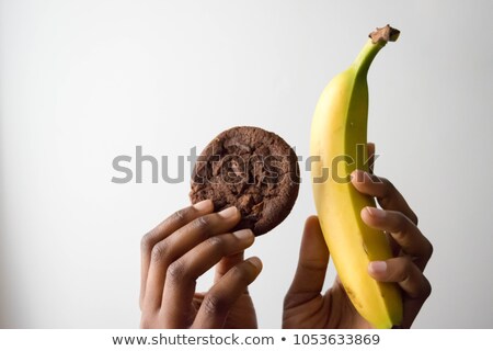 ストックフォト: Woman Choosing Between Dark And White Chocolate