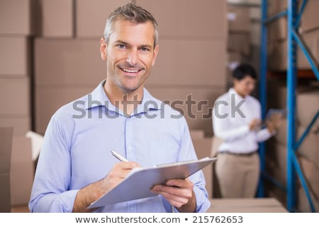 [[stock_photo]]: A Pretty Warehouse Manager